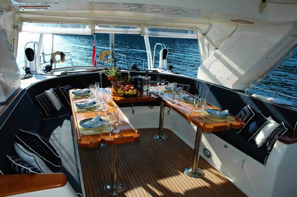 Yacht salon tables set for a catering charter
