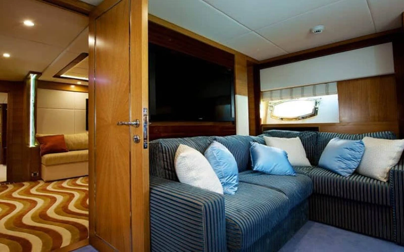 Comfortable indoor sofa lounge on 75ft yacht – yacht rental Dubai | Mala Yachts
