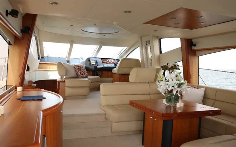 Elegant lounge area inside Daydream Yacht – yacht rental Dubai | Mala Yachts