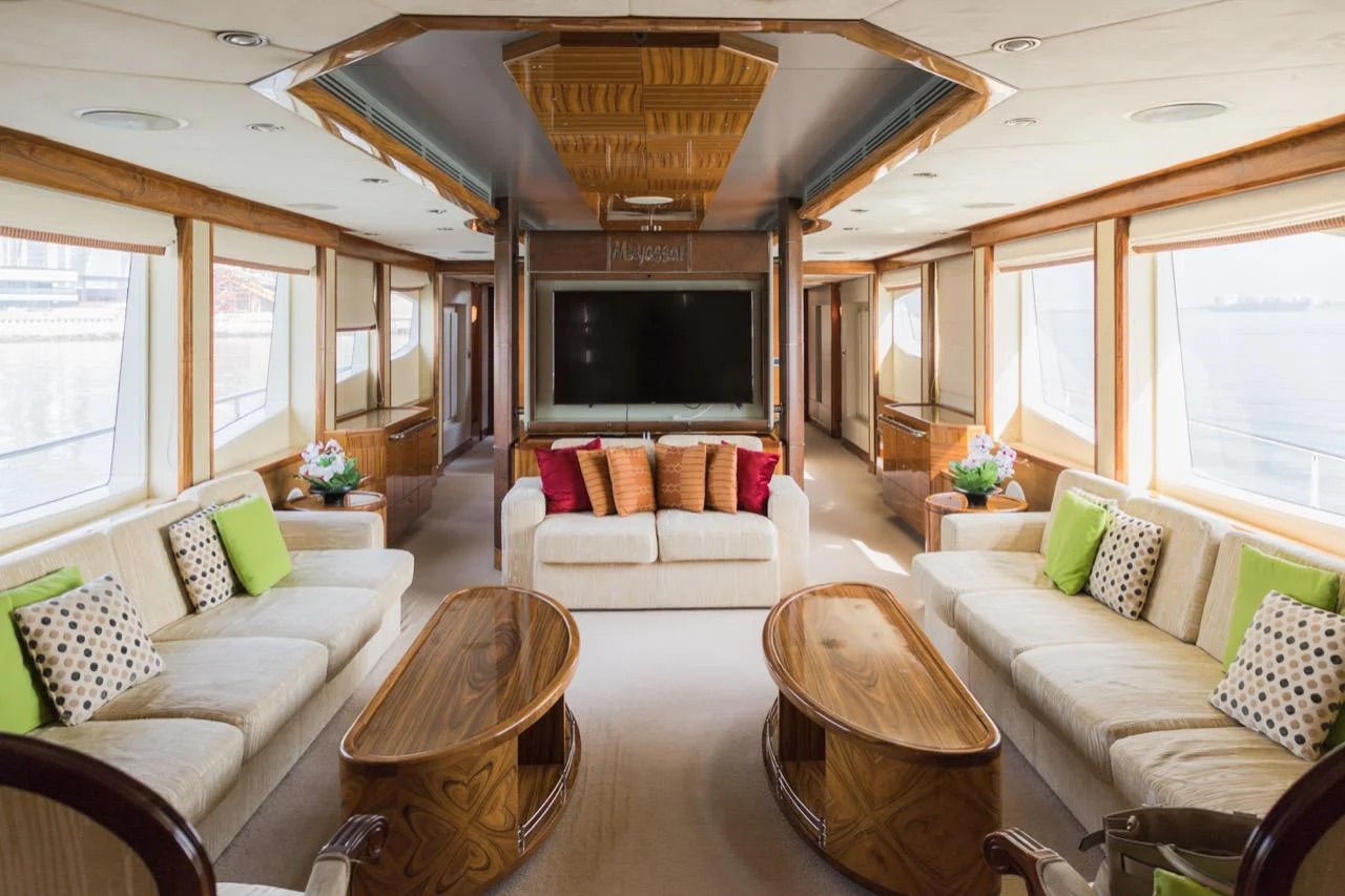 "Spacious salon area inside the 101 Feet Yacht by Mala Yachts – perfect for luxury yacht rental Dubai."
