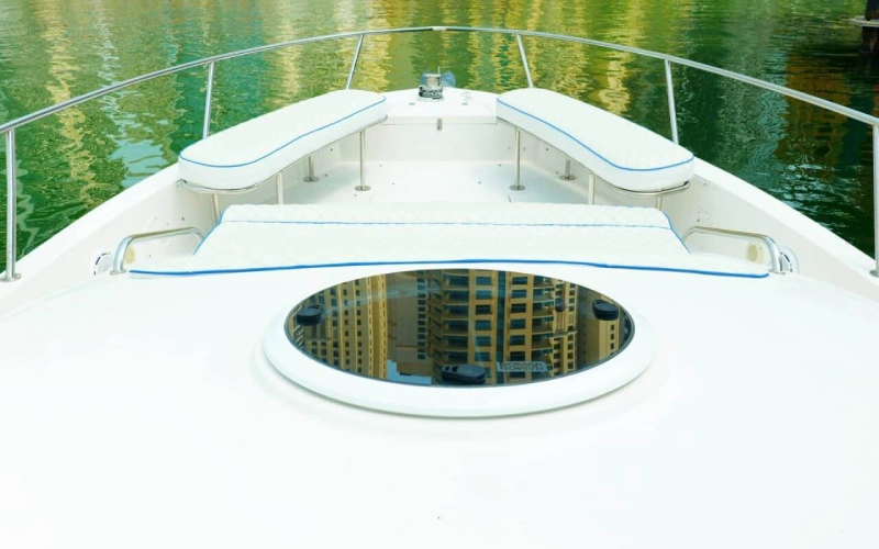 Blue Fin Yacht anchored at the marina showcasing its stylish exterior profile