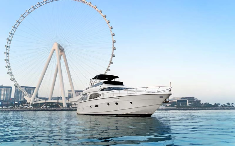 Front bow of Lava Yacht with open lounging area and safety railings under bright sky