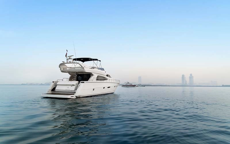 Top deck of Lava Yacht featuring sun loungers and unobstructed views of the sea