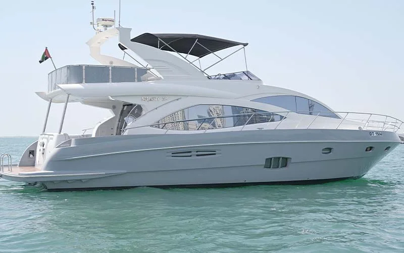 Side profile of Maze Yacht cruising on open water with sleek hull and flybridge visible