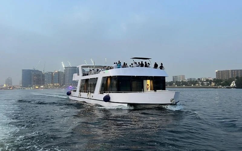 Flybridge with sun loungers, jacuzzi, and seating area on 100ft Bela Vita Yacht
