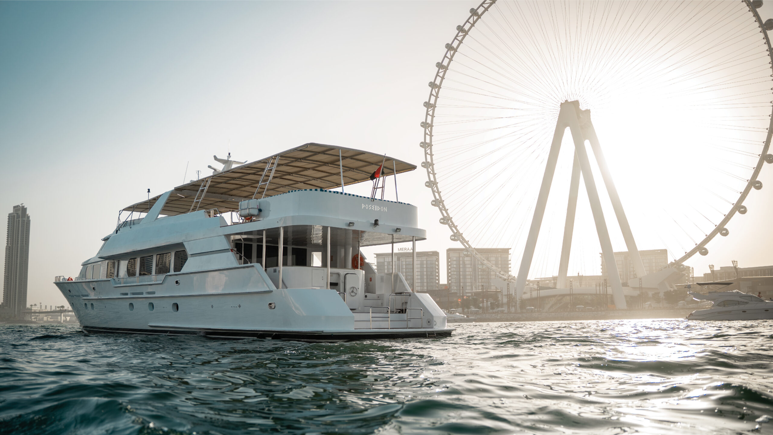 "Poseidon yacht cruising through Dubai waters – Mala Yachts luxury yacht rental in Dubai"