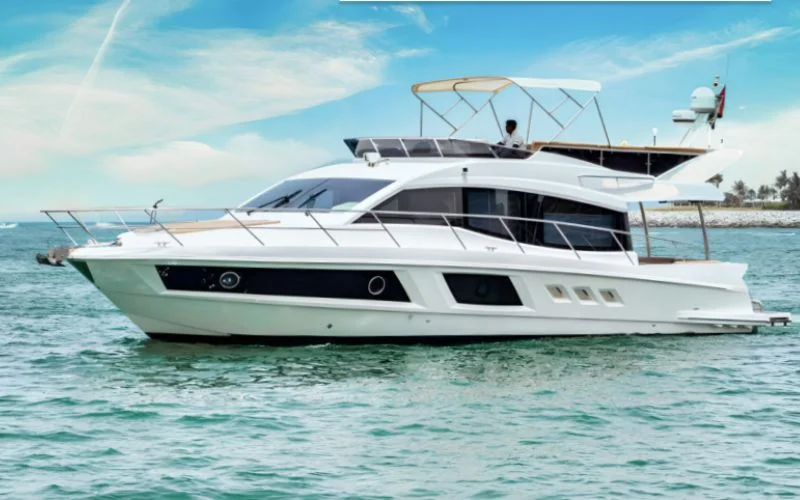 "Majesty 48 yacht cruising through Dubai waters – Mala Yachts top-tier yacht rental in Dubai"