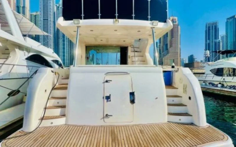 Panoramic salon interior aboard Majesty 70ft yacht offering stunning sea views and plush lounge seating – elevate your escape with yacht rental in Dubai by Mala Yachts.