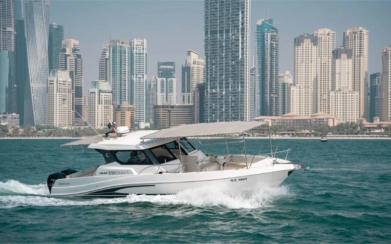 Sleek exterior of the Storm 36ft yacht against Dubai’s skyline – Mala Yachts provides stylish and budget-friendly yacht rental in Dubai.