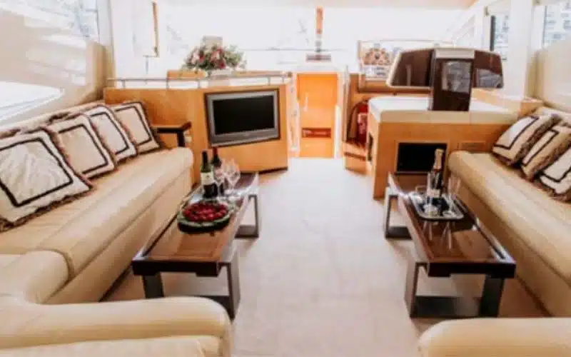 Spacious and modern lounge inside the Vassia yacht with plush seating – Mala Yachts delivers a luxury yacht rental in Dubai tailored for comfort.