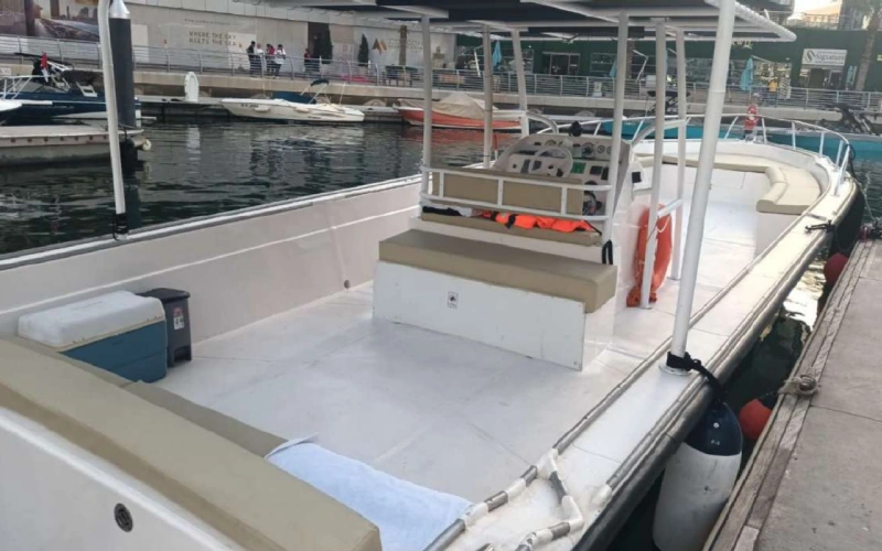 Compact and elegant interior of Dubai Marine 32ft yacht – yacht rental Dubai by Mala Yachts
