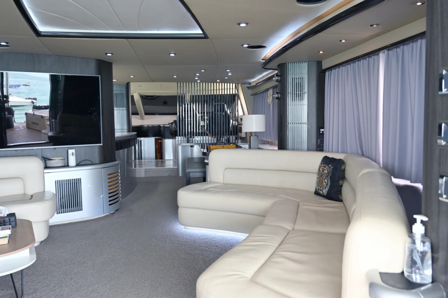 Elegant interior of Sunseeker 64ft yacht with modern lounge and dining area – Mala Yachts luxury yacht rental in Dubai