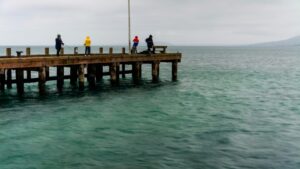 Three men fishing in Dubai waters